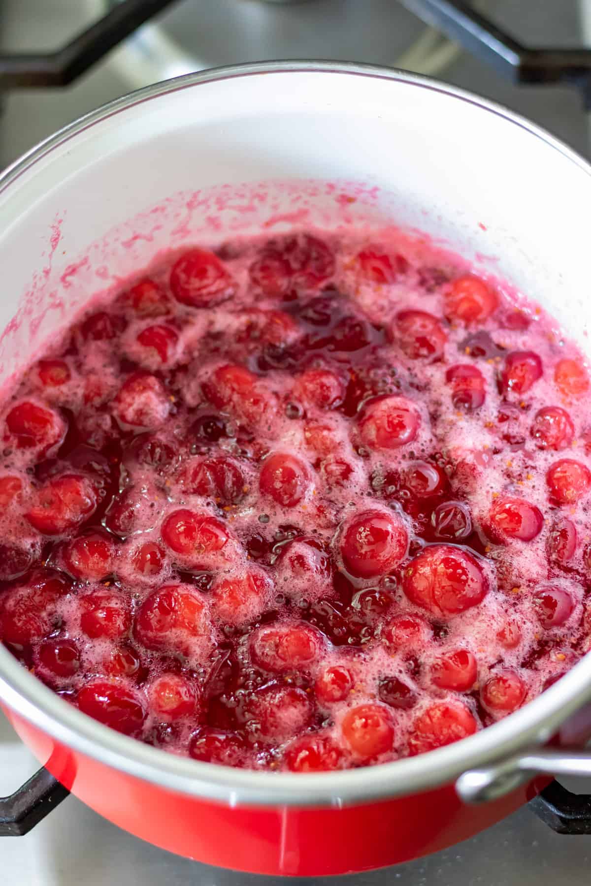 Boiling the cranberry syrup.