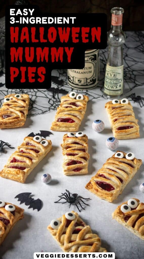 Rows of Mummy Halloween Pies on a table surrounded by plastic spiders, with text: Easy 3 ingredients halloween mummy pies.