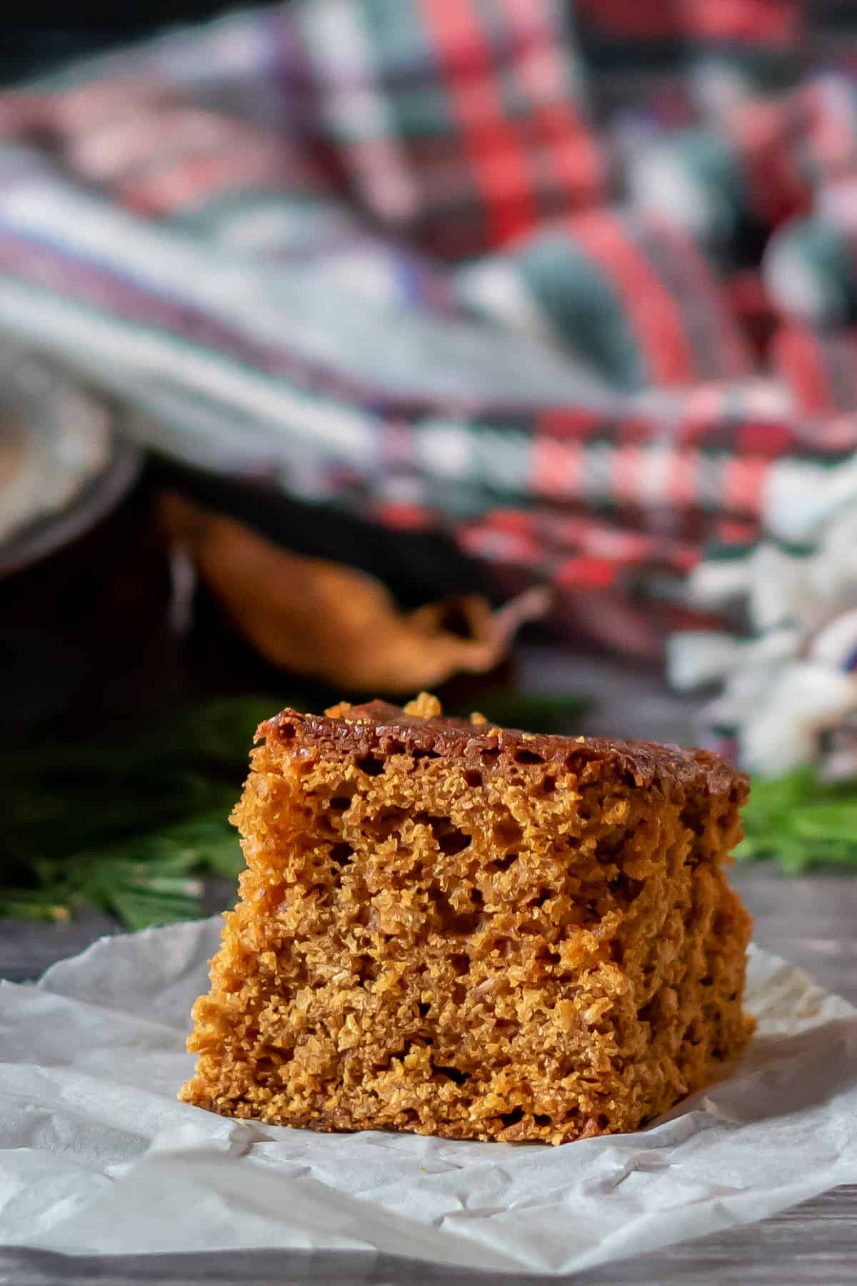 Side view of a slice of parkin cake.