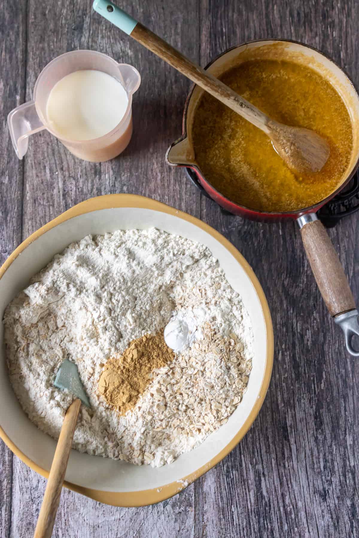 Stirring the dry ingredients in a mixing bowl.