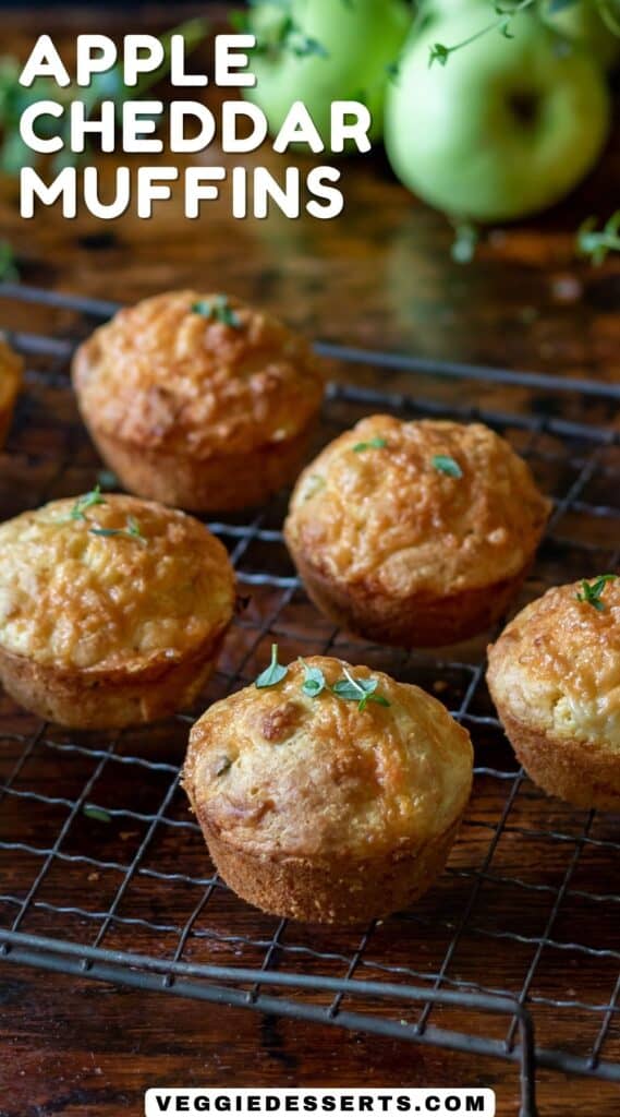 Wire rack of muffins, with text: Apple Cheddar Muffins.