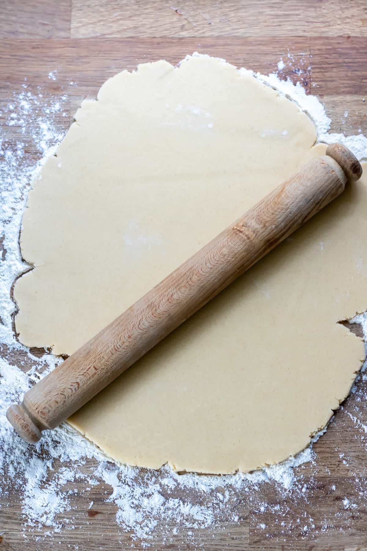 Rolling out the sugar cookie dough.