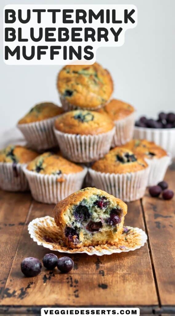 A table of muffins, with one with a bite out, and the text: Buttermilk Blueberry Muffins.