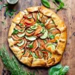 A ratatouille galette pie on a wooden table.