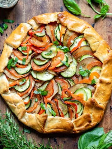 A ratatouille galette pie on a wooden table.