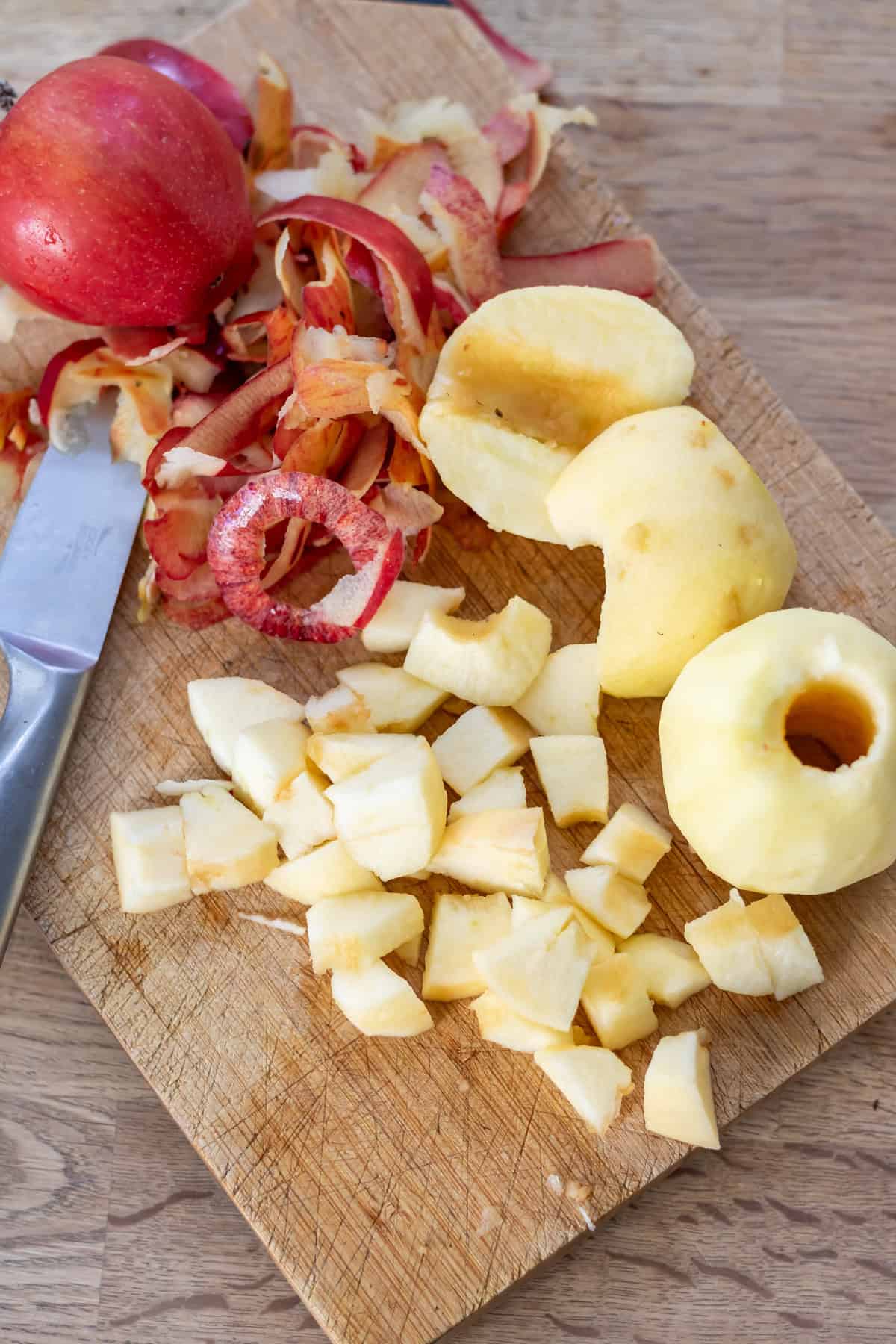 Peeling and chopping the apples.
