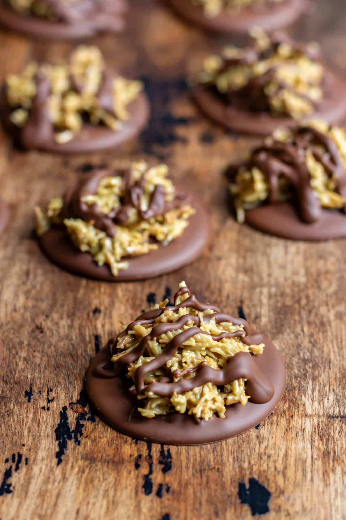 Side view of Dubai chocolate bites on a wooden table.