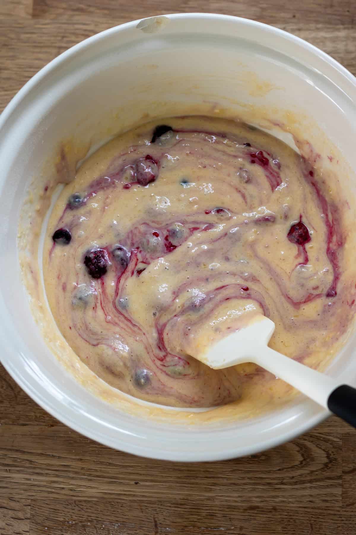 Frozen berries added to the batter.