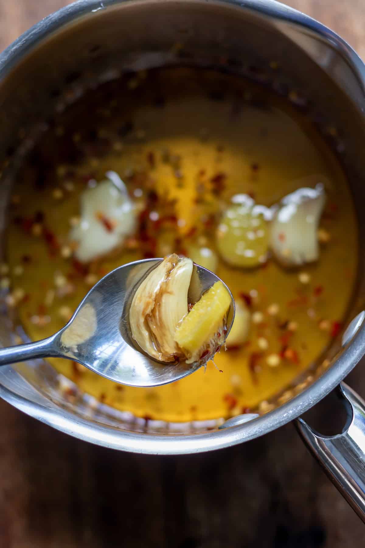 Spooning out the ginger and garlic.