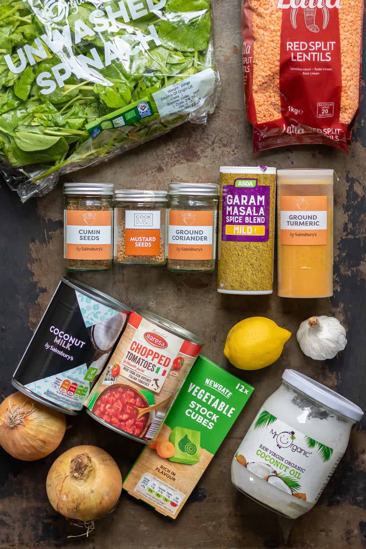 Ingredients for lentil dahl on a table.