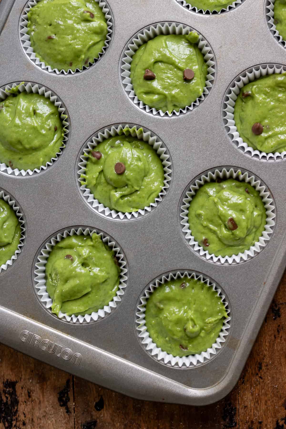 Batter in the muffin pan ready to bake.
