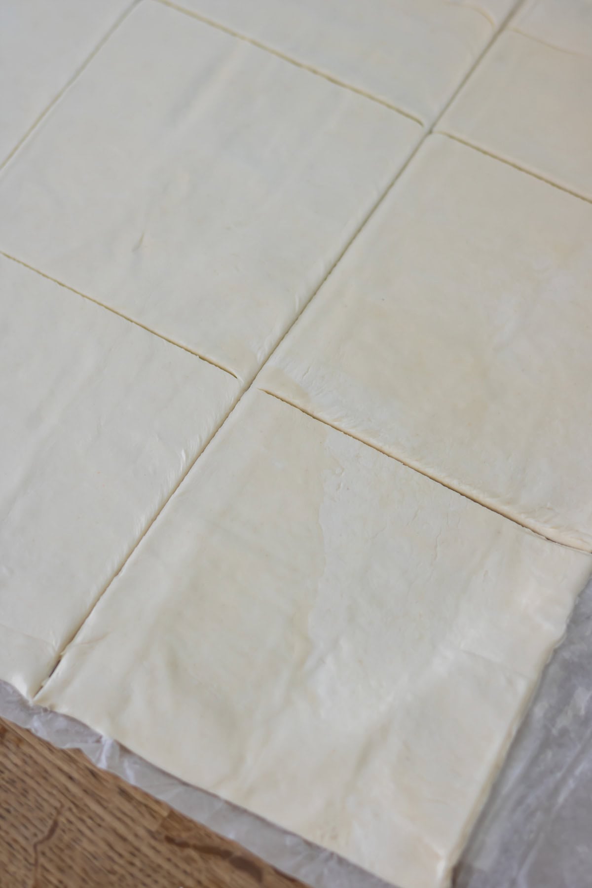 Cutting the pastry into squares.