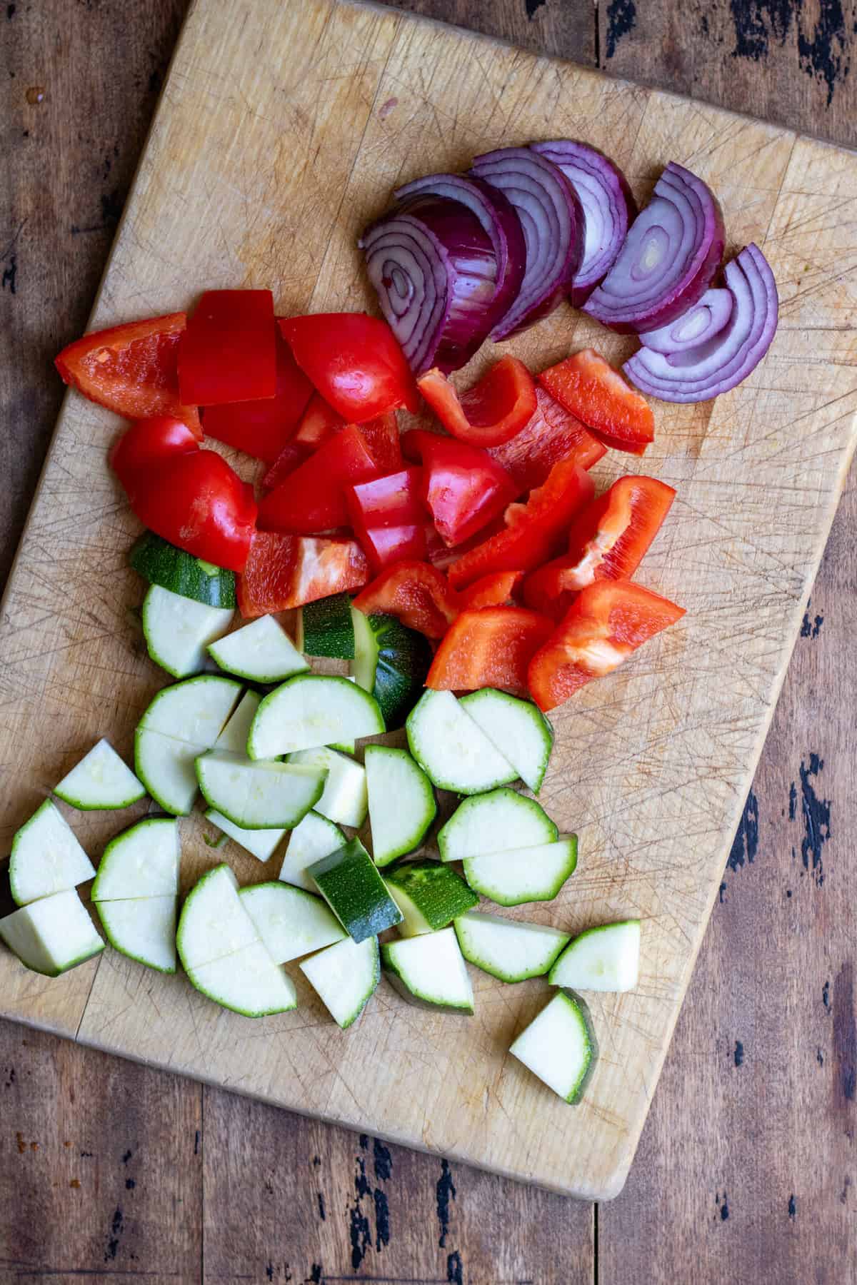 Chopped courgette, bell peppers and red onions.