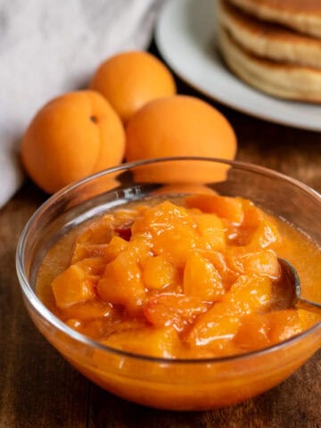 Fresh apricot compote in a bowl.