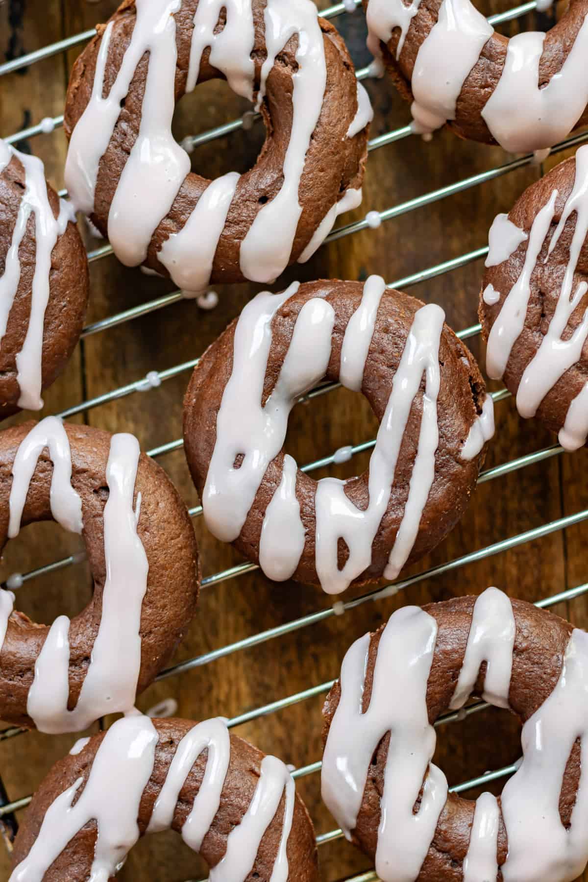 Close up of baked beetroot chocolate donuts with beet glaze.
