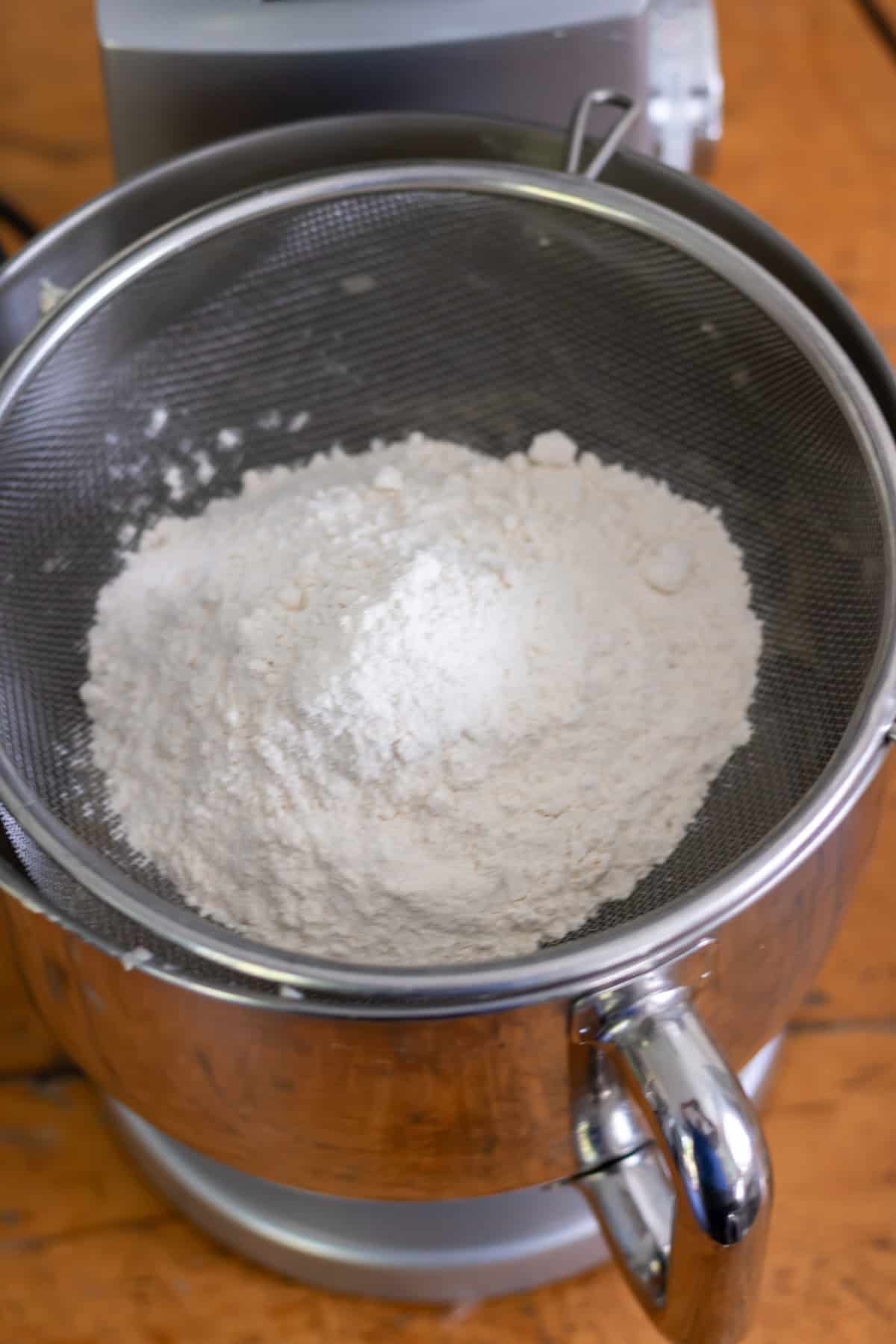 Sifting in the dry ingredients.