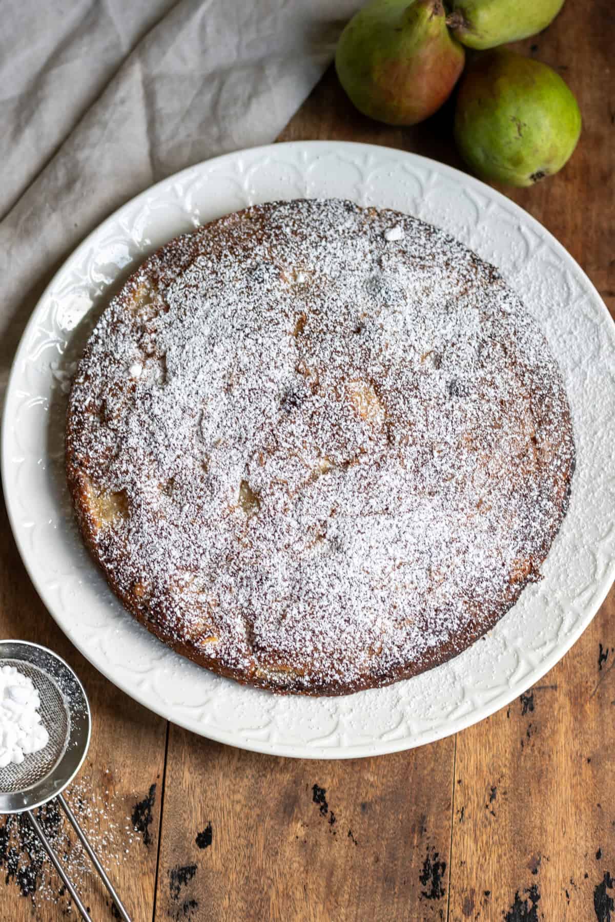 Powdered icing sugar sifted over the cake.