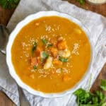 Looking down at a bowl of miso sweet potato soup.