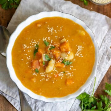 Looking down at a bowl of miso sweet potato soup.