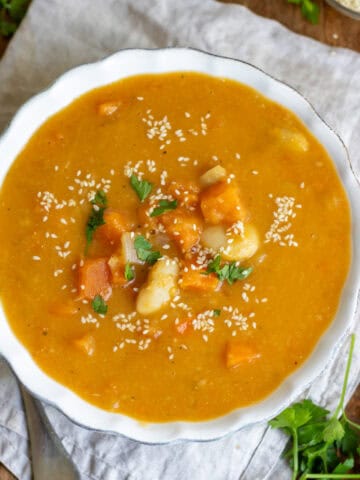 Looking down at a bowl of miso sweet potato soup.