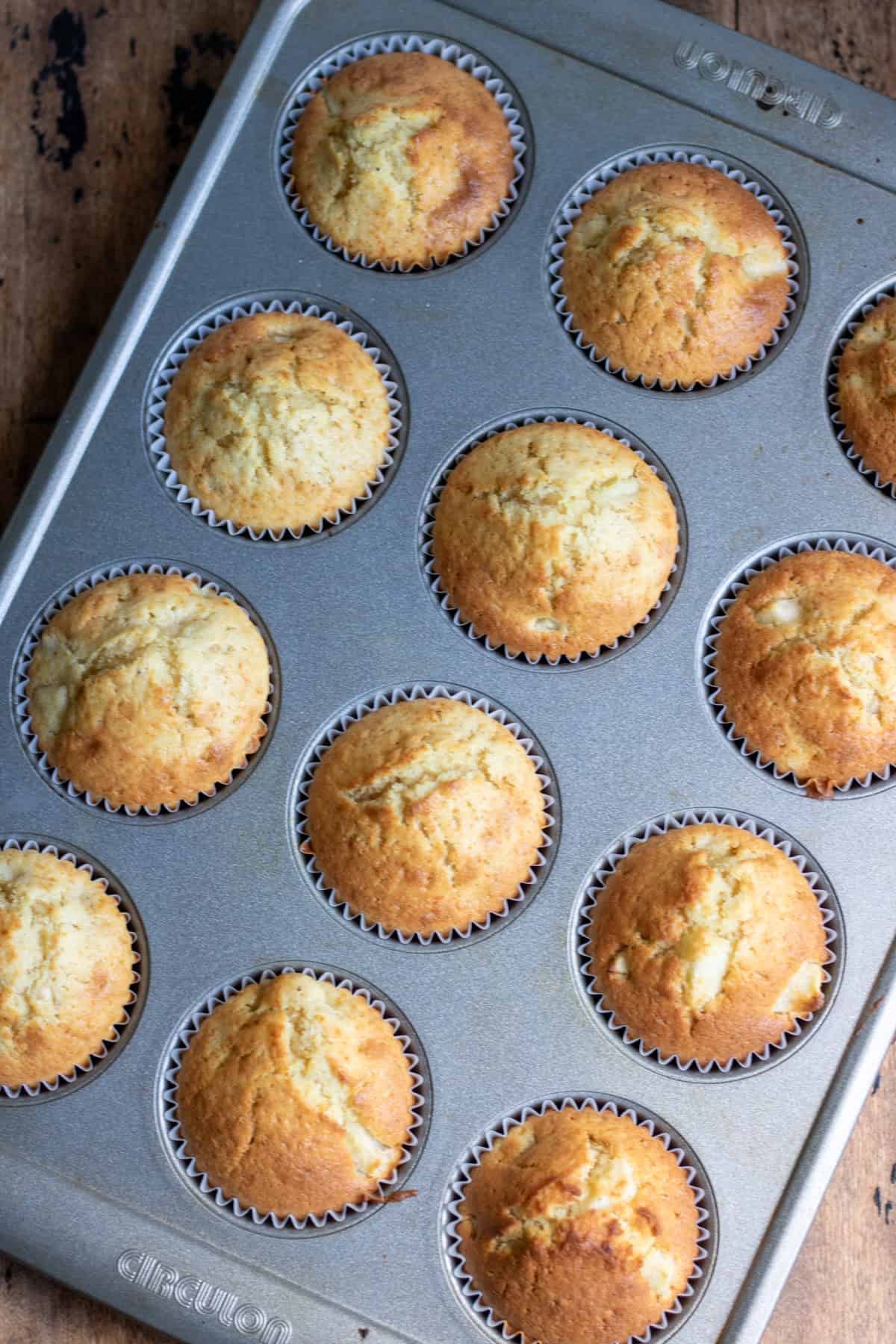 Muffins baked in a muffin pan.