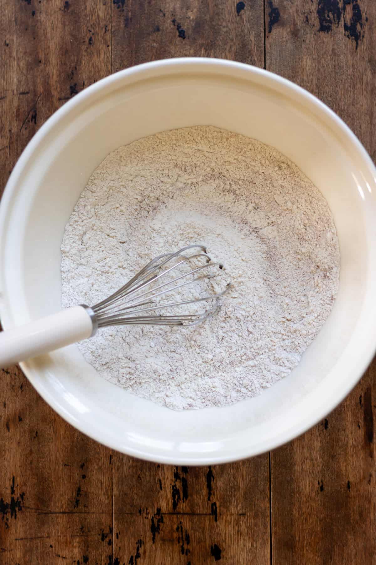 Whisking the dry ingredients in a bowl.