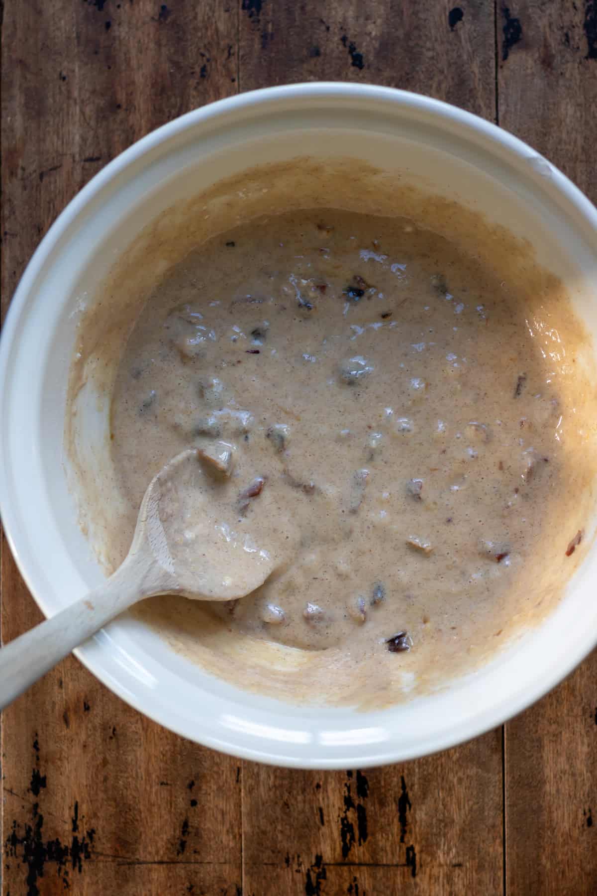 Mixed pecan date muffin batter.