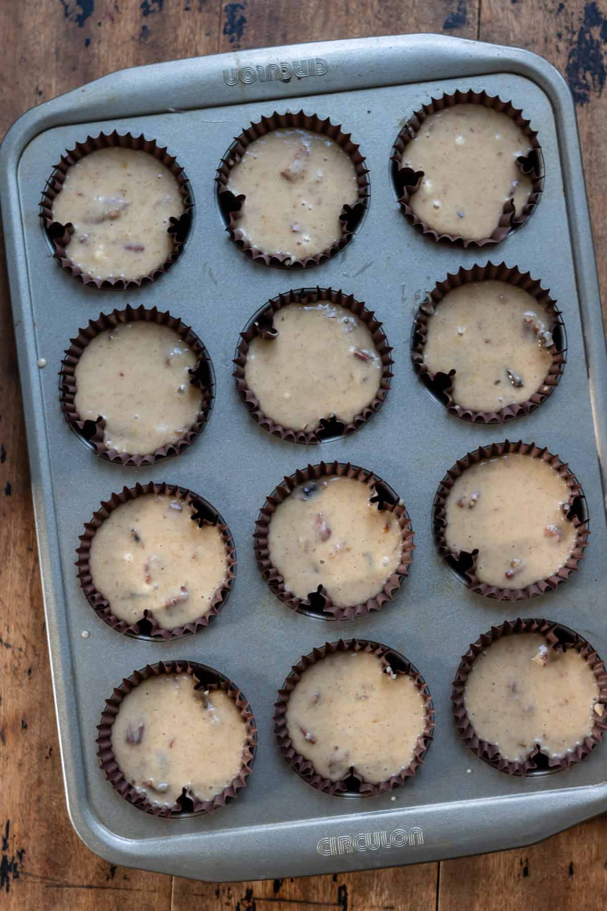 Batter in the muffin cups.