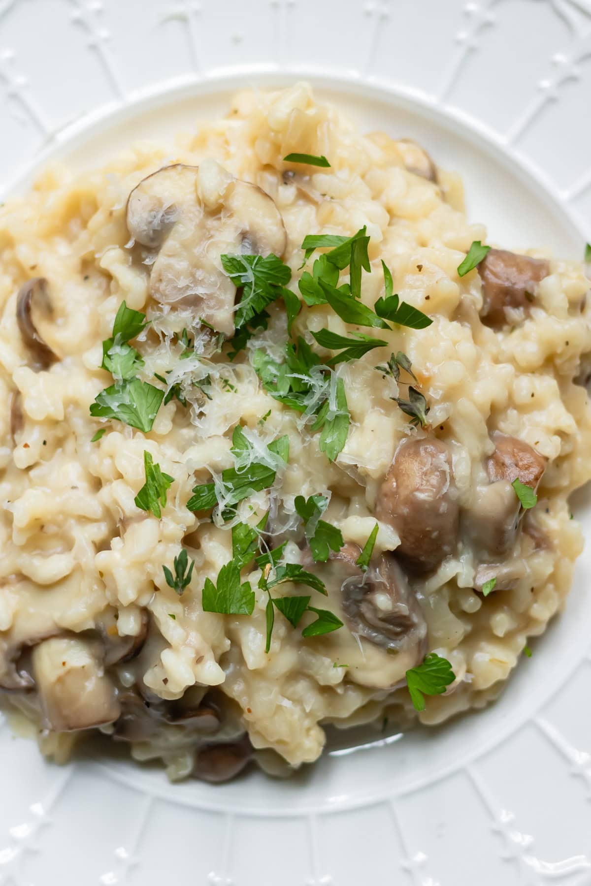 Close up of a plate of slow cooker mushroom risotto.
