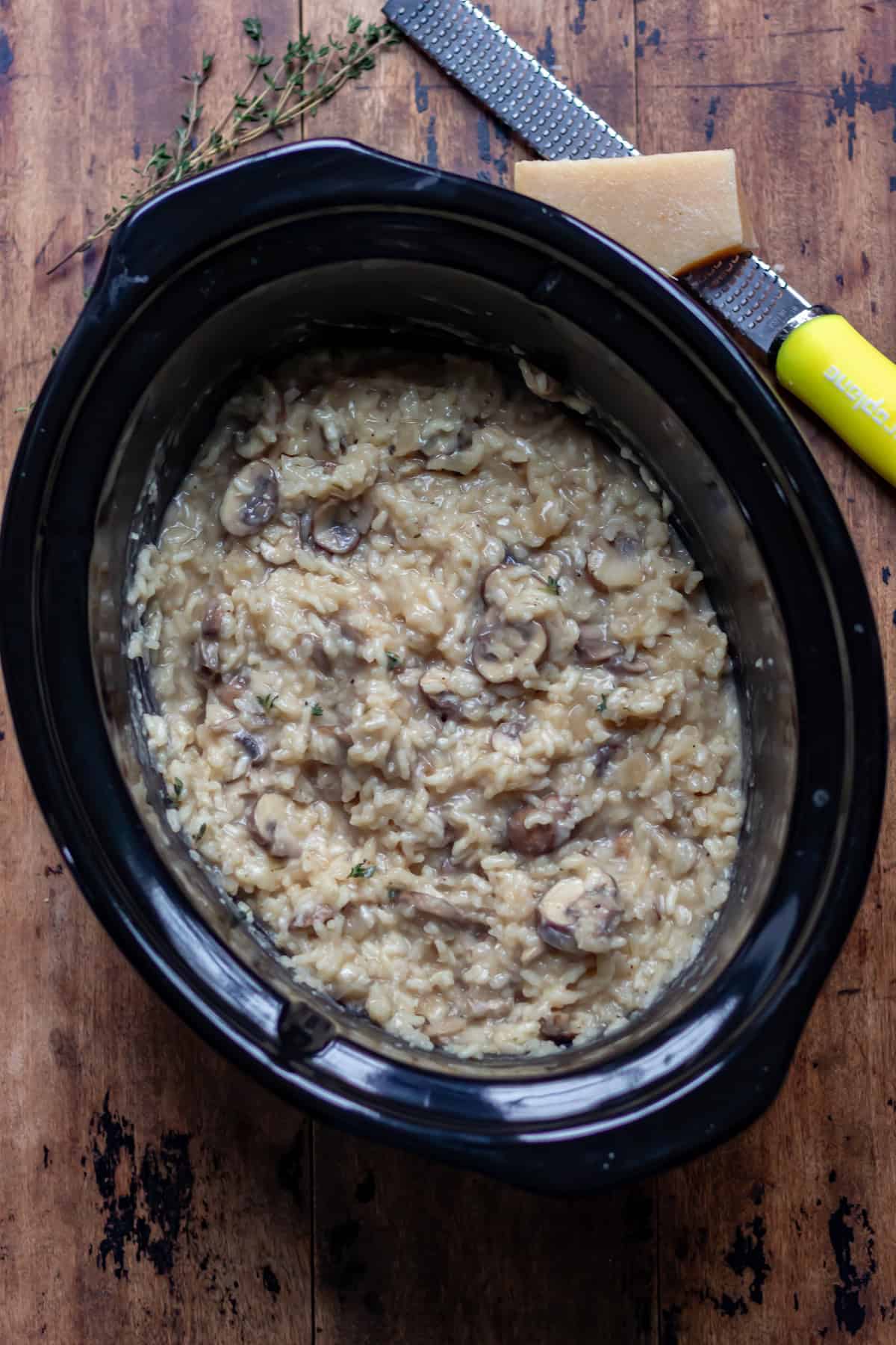 Cooked mushroom risotto in the slow cooker.