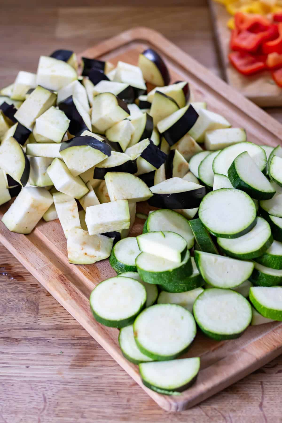 Chopped courgette/zucchini and aubergine/eggplant.