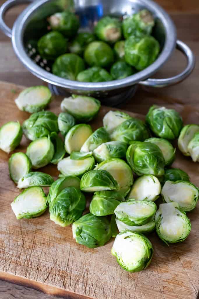 Cutting brussels sprouts.