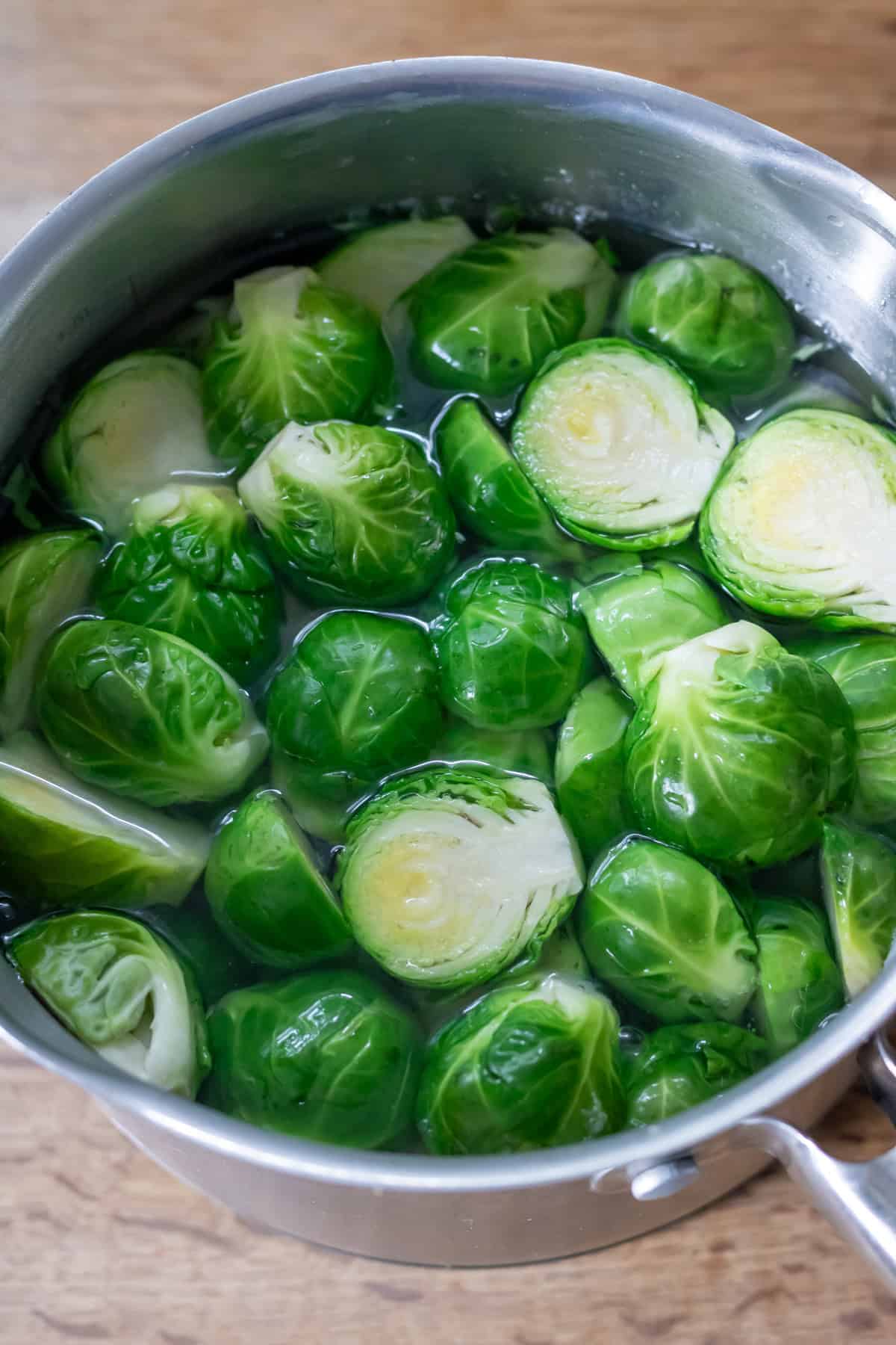 Part boiling the brussels sprouts.