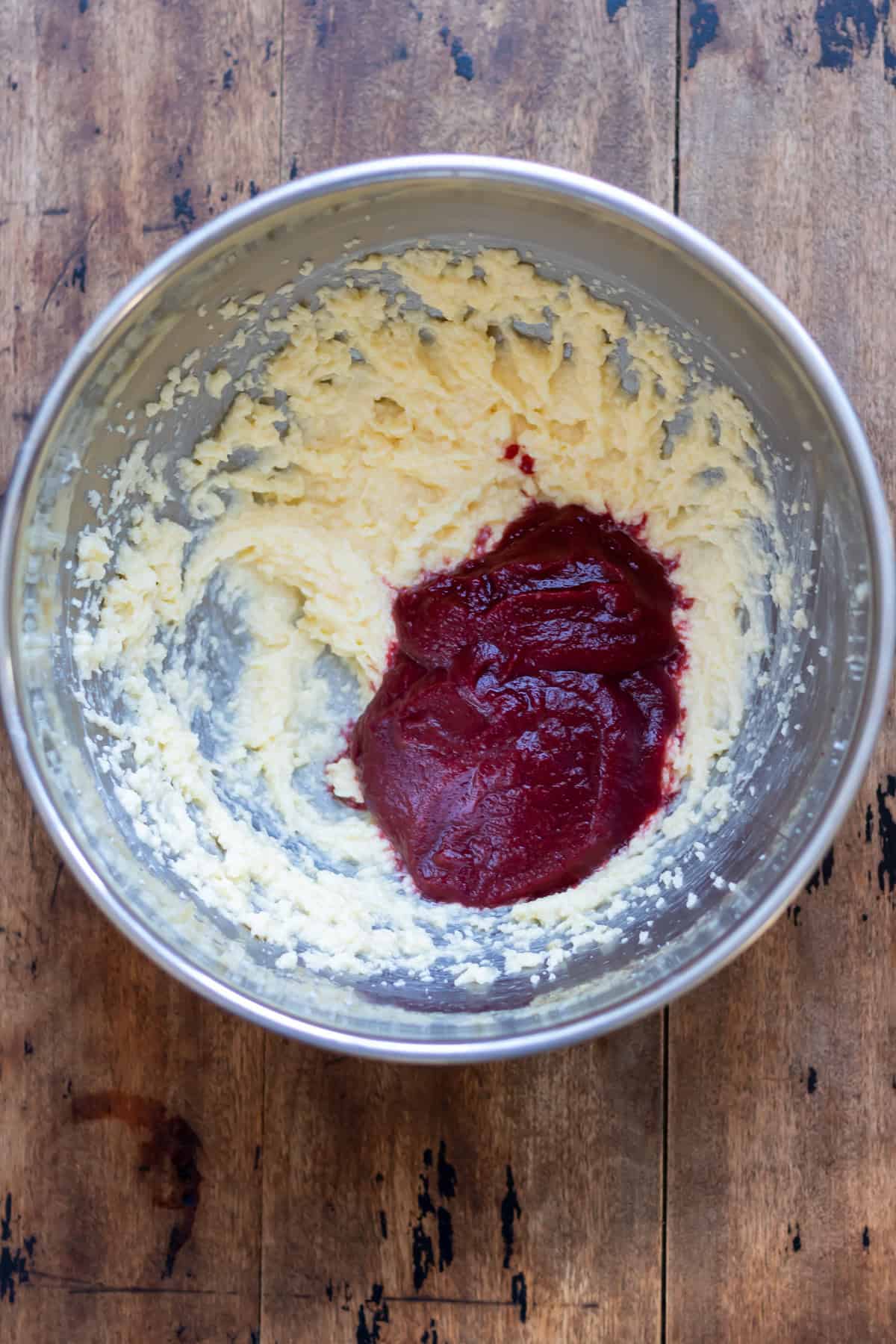 Pureed beetroot added to the mixing bowl.