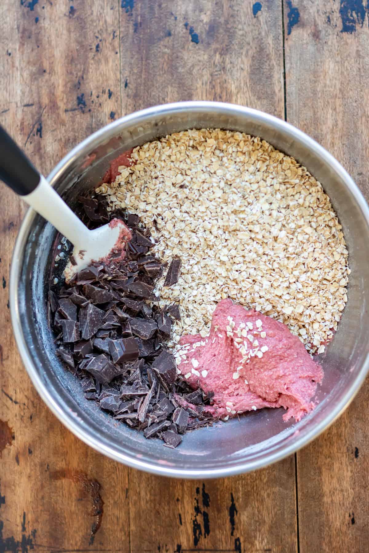 Oats and chopped dark chocolate added to the mixture.