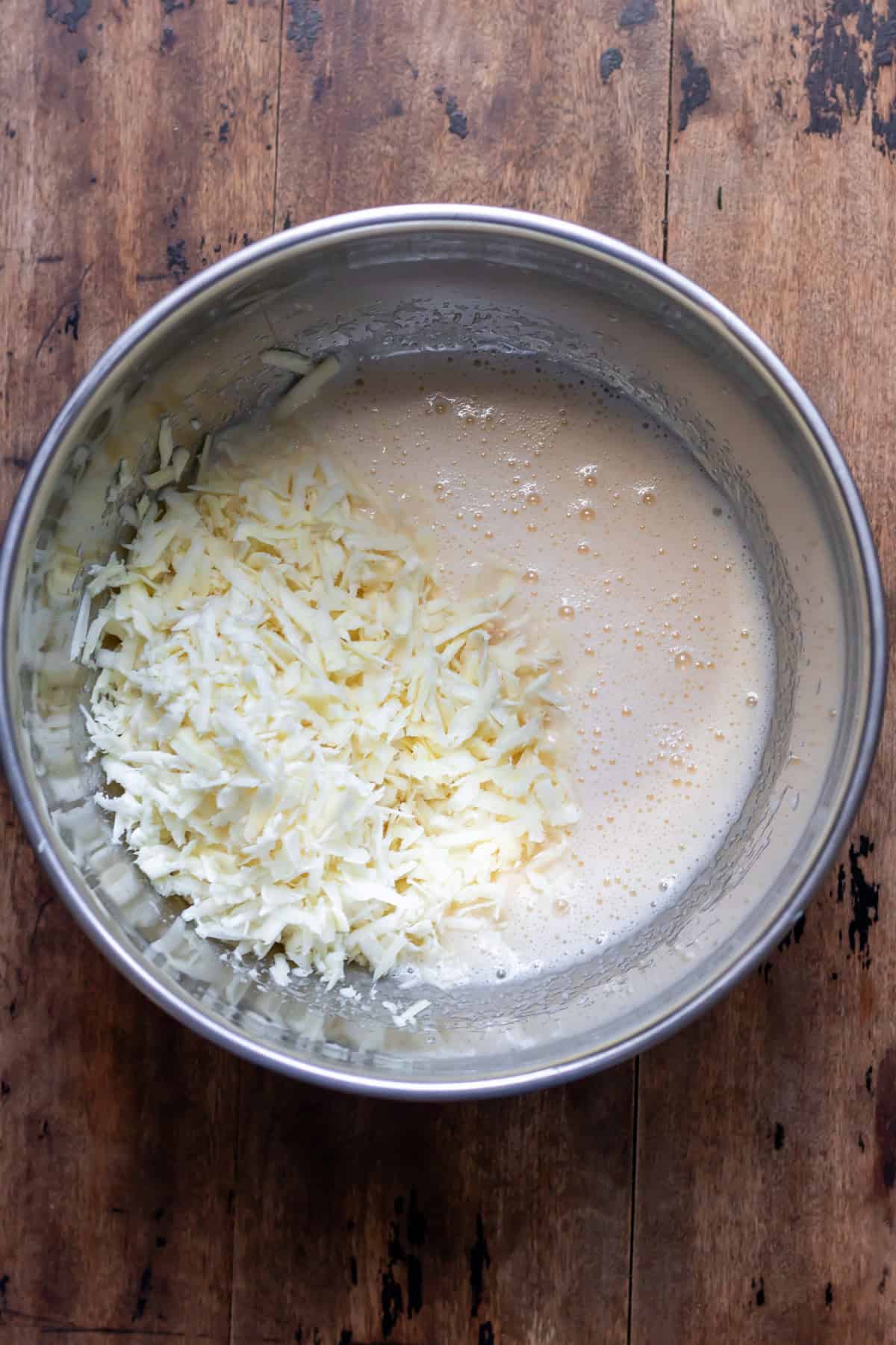 Grated parsnips added to the wet ingredients.