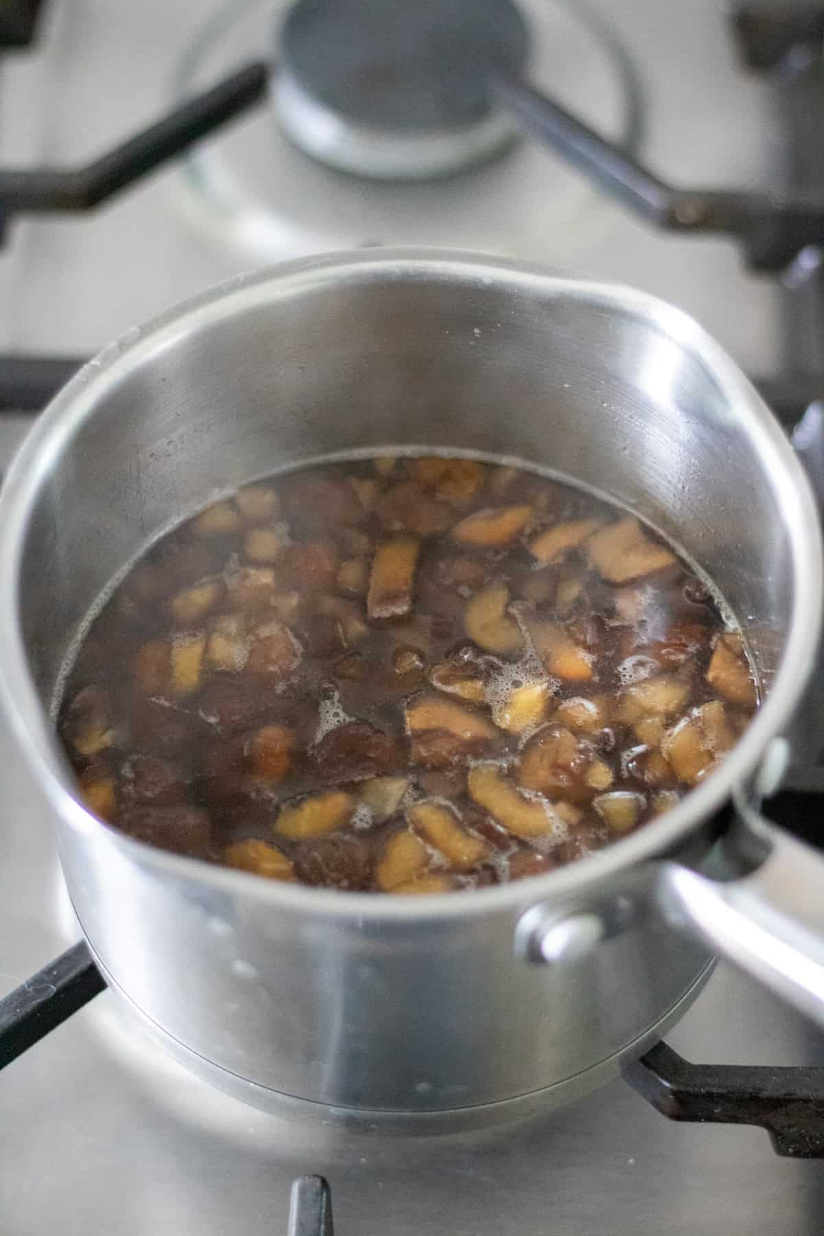 Simmering the chestnut syrup.