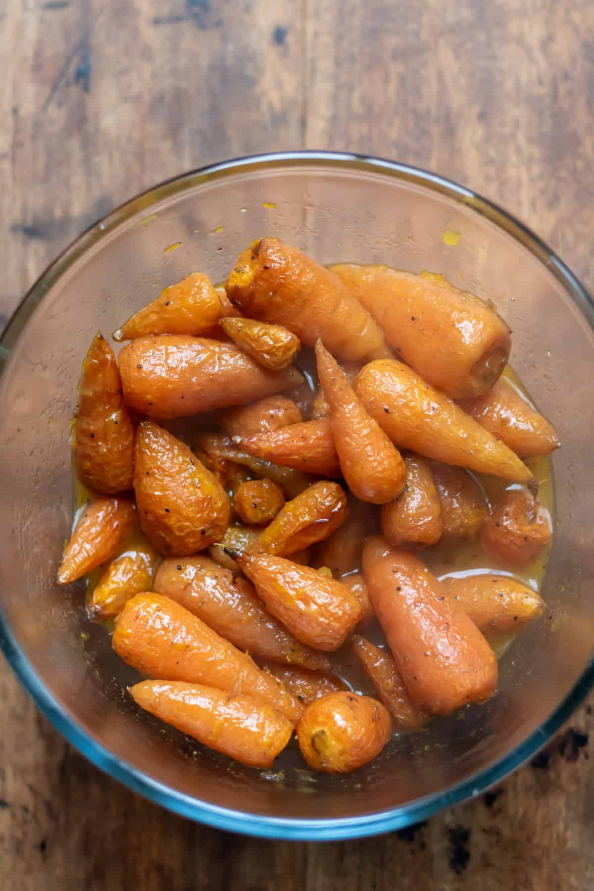 Honey orange dressing poured over the roasted carrots.