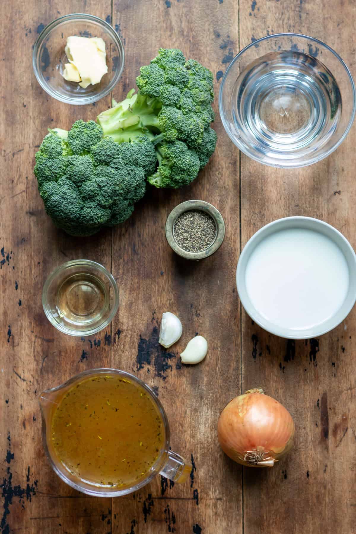 Broccoli soup ingredients on a table.