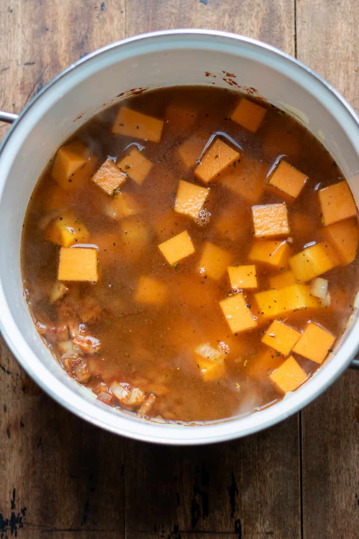 Stock and squash added to the pot.