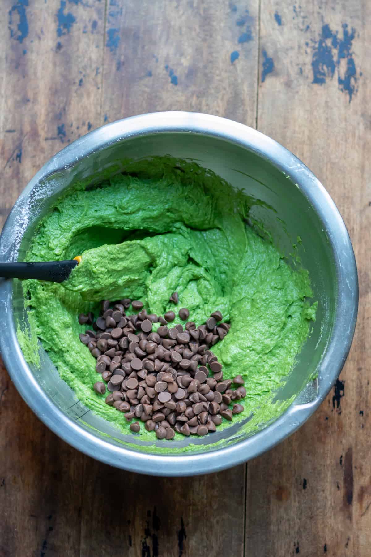 Chocolate chips added to the kale muffin batter.