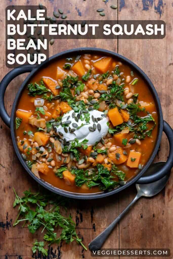 Dish of soup with text: Kale, Butternut Squash and Bean Soup.