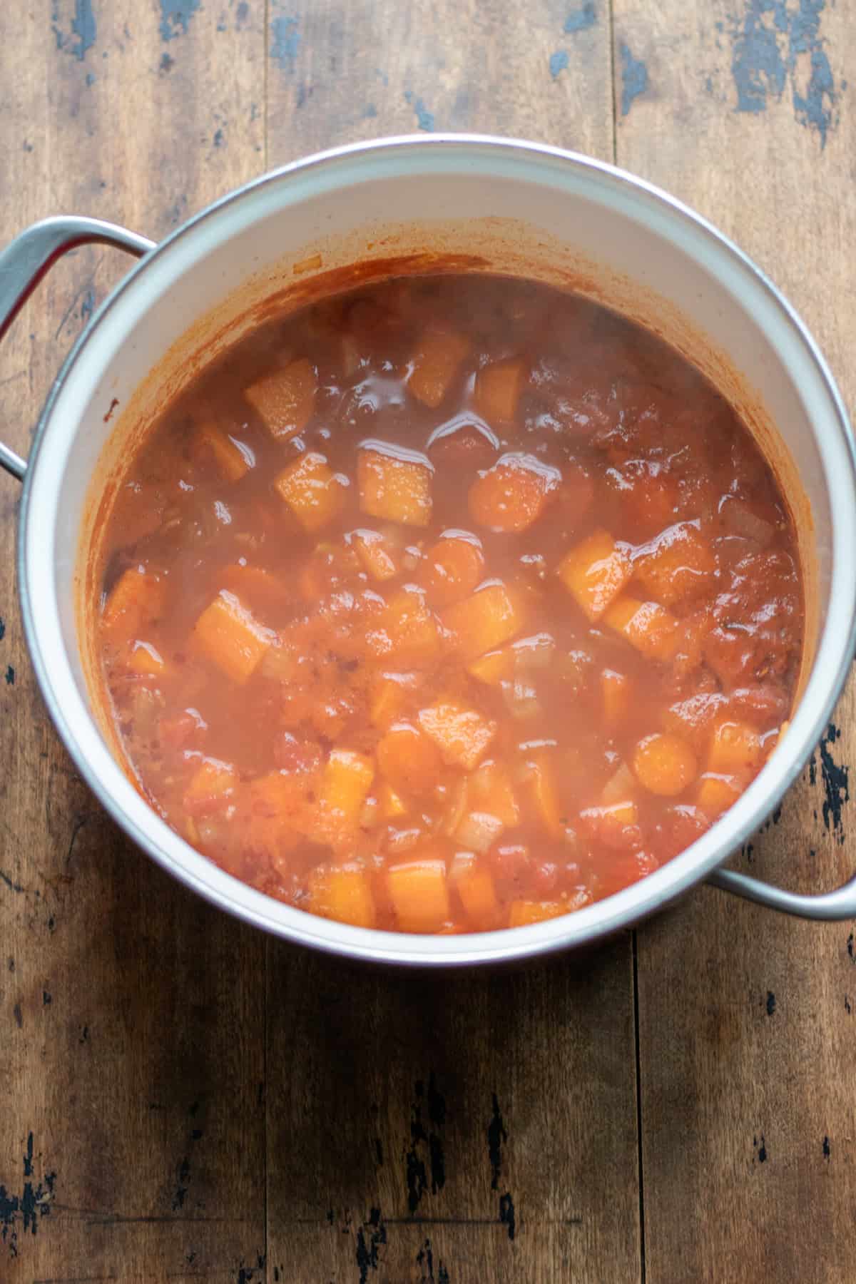 Cooked chipotle sweet potato soup in the pot.