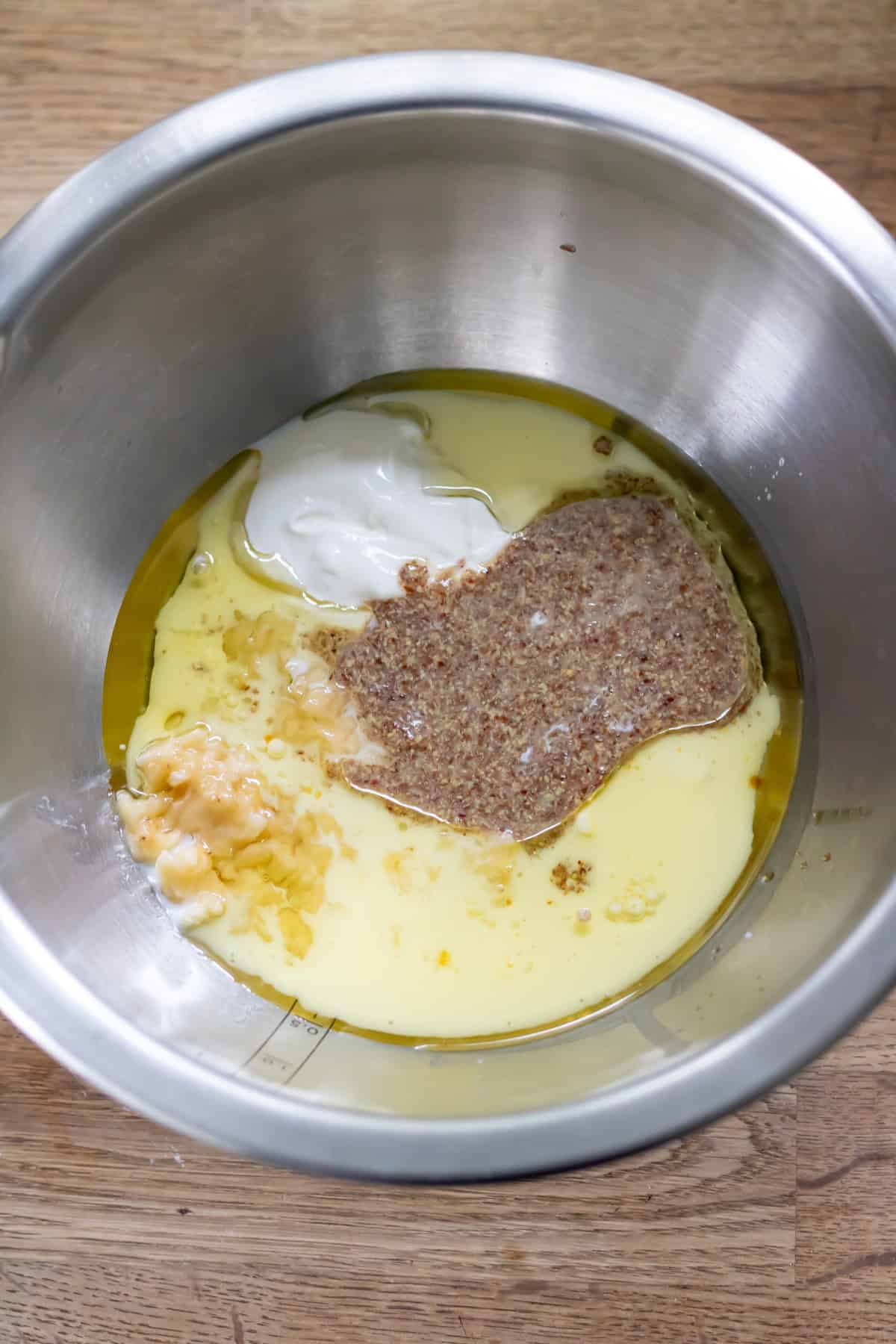 Wet ingredients in a mixing bowl.
