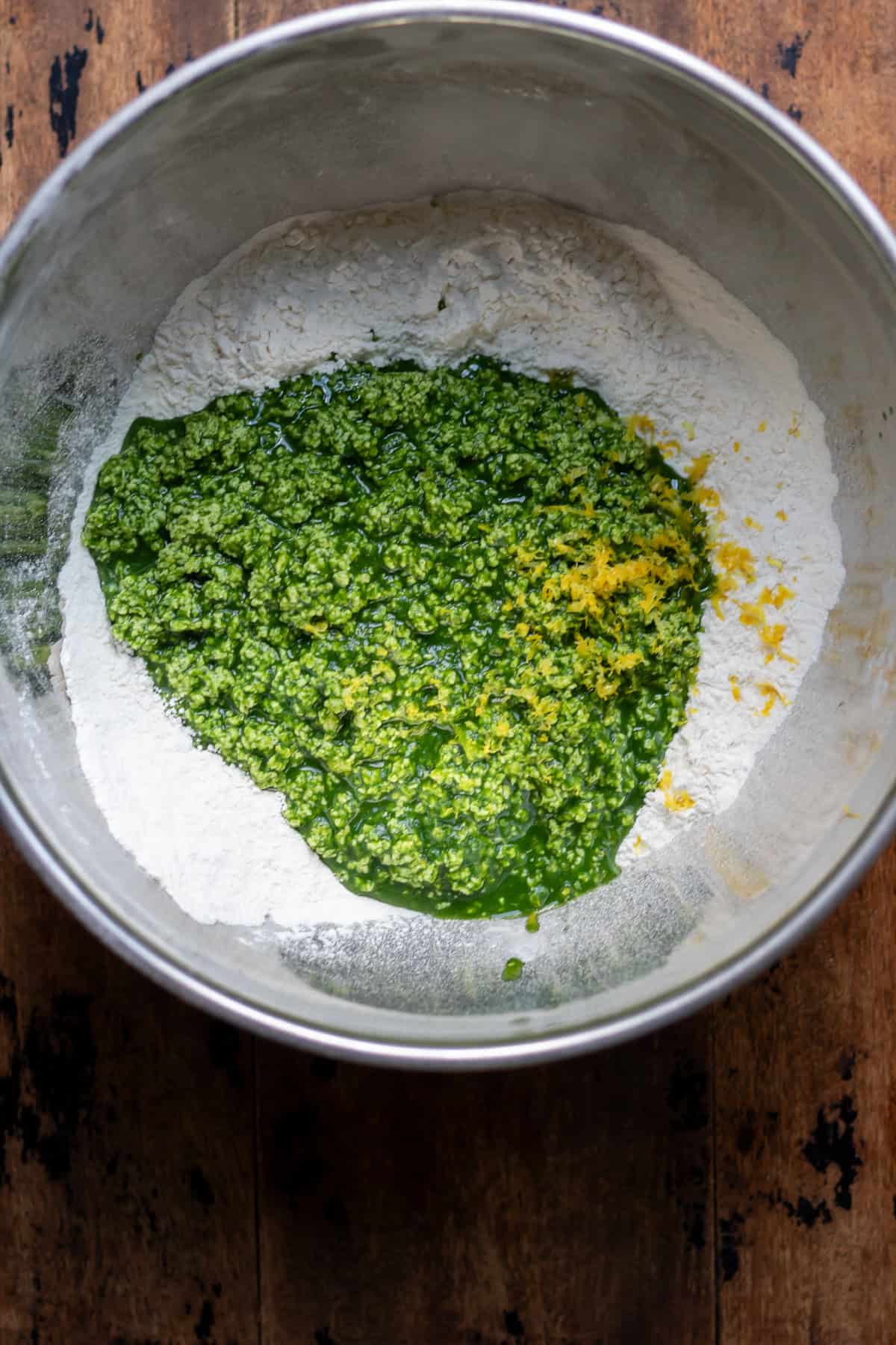 Wet ingredients added to the dry, along with the lemon zest.