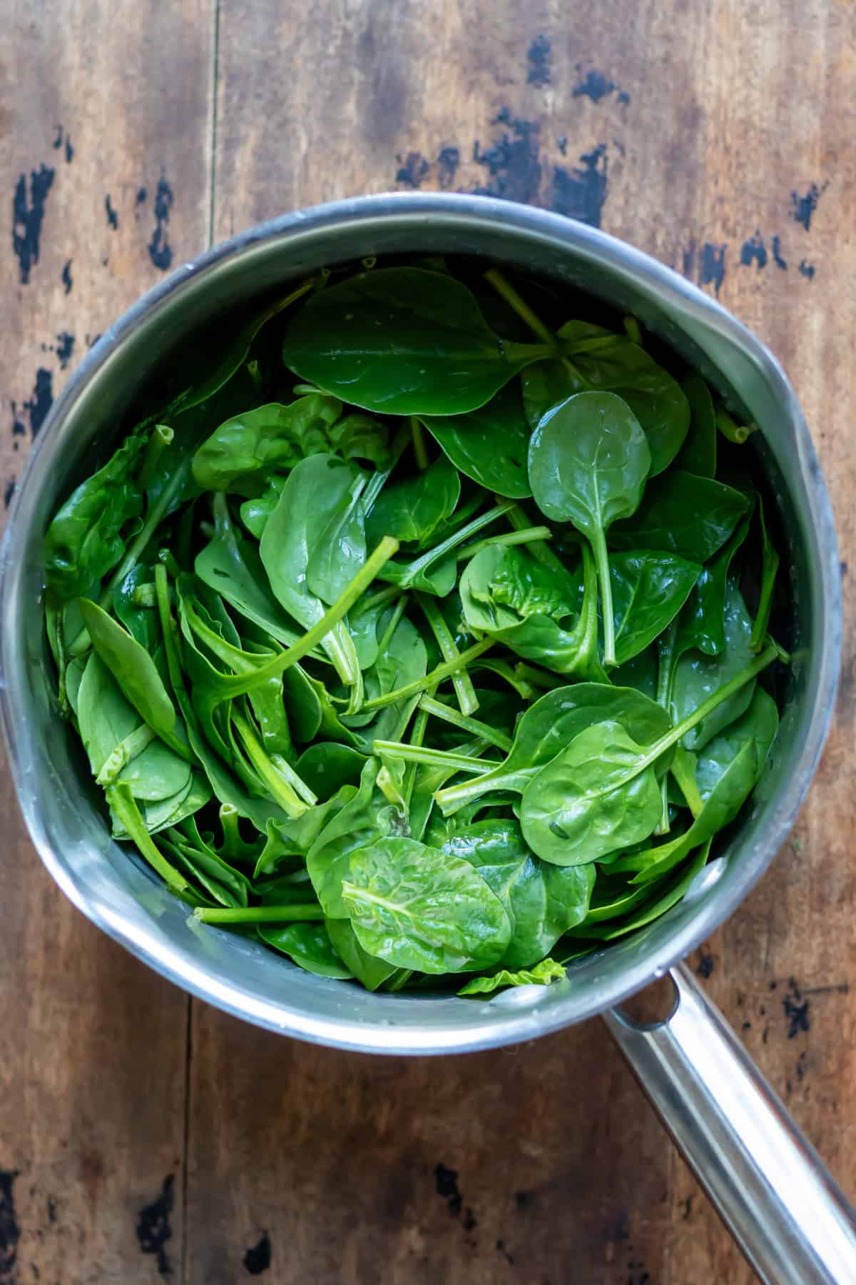 Spinach leaves in a pot.
