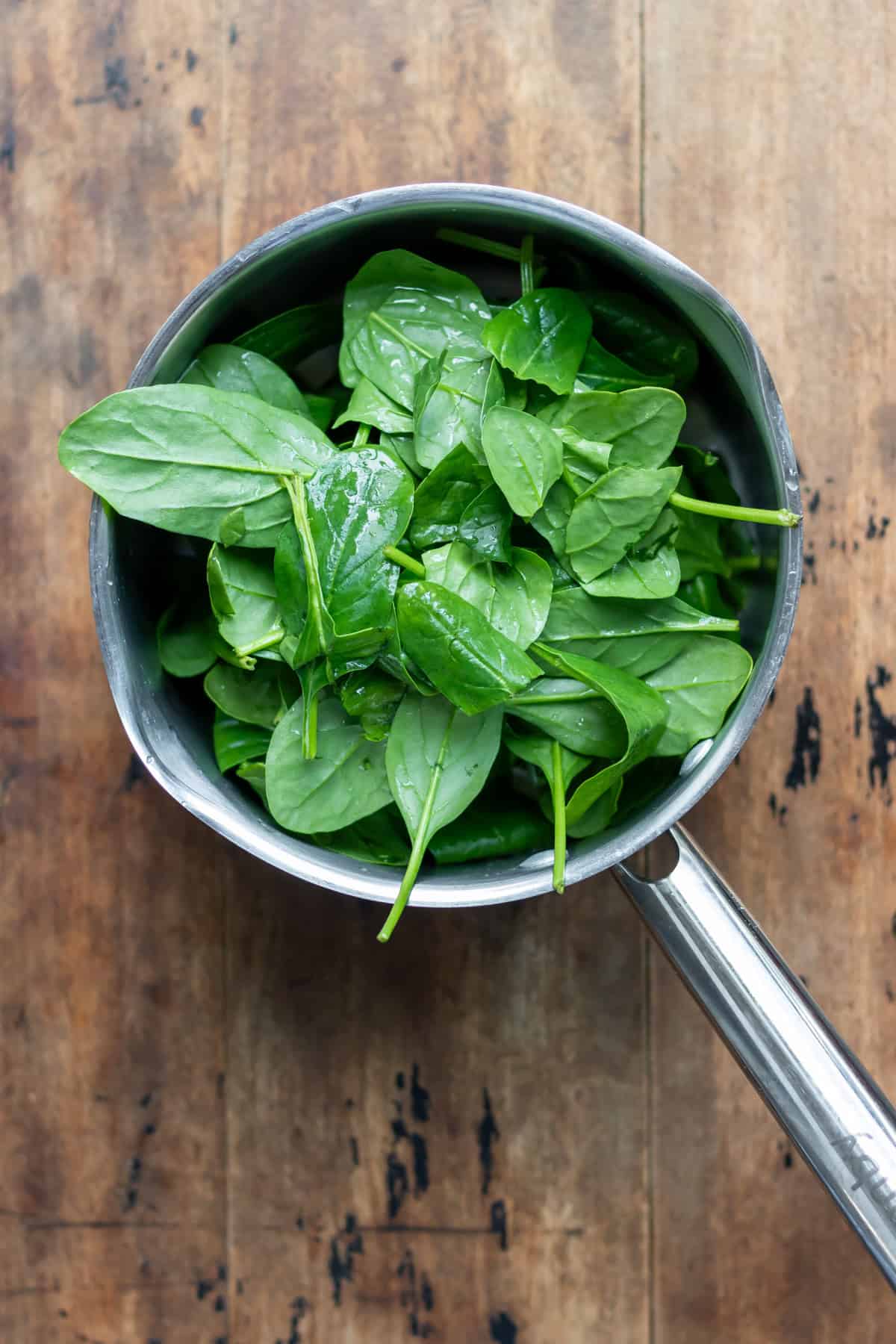 Spinach leaves in a pot.
