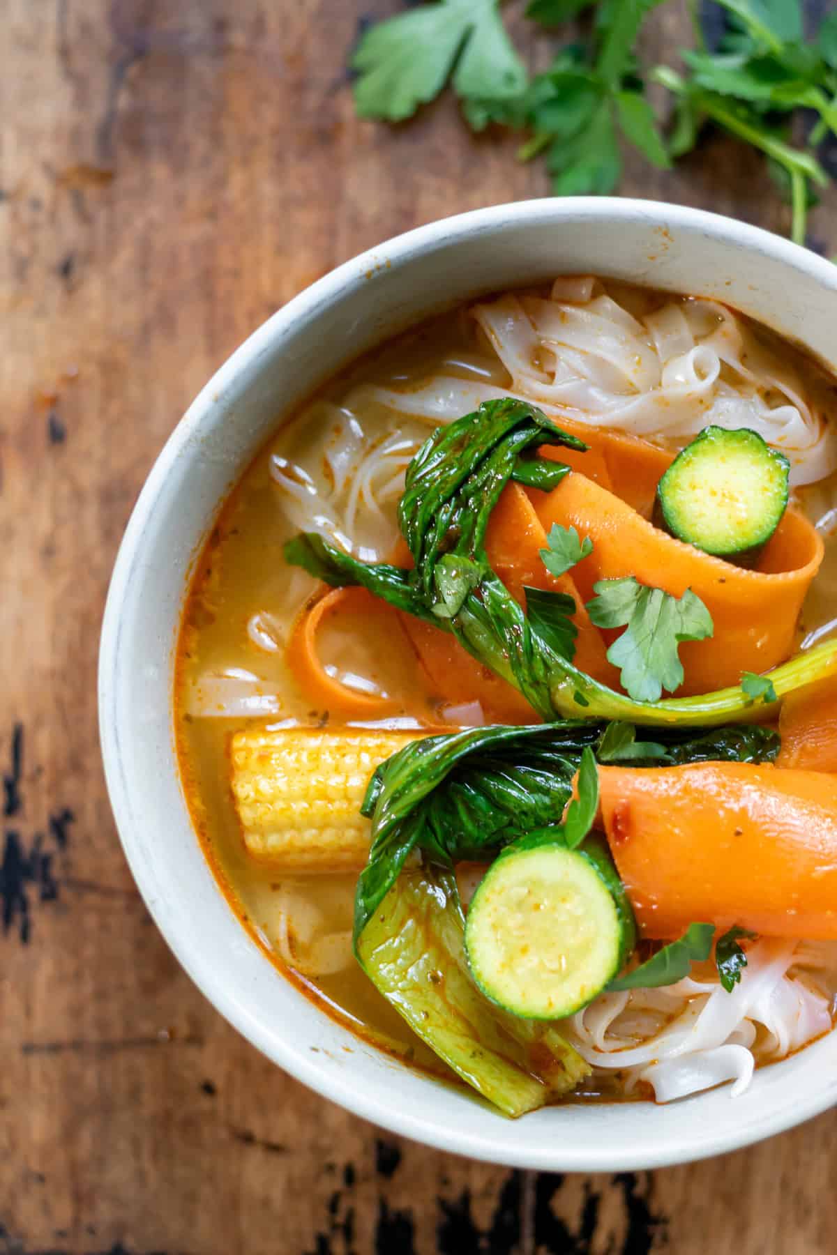 Close up of a bowl of Thai Vegetable Noodle Soup.