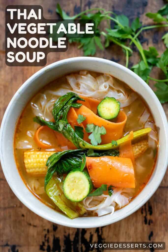 Bowl of soup, with text: Thai Vegetable Noodle Soup.