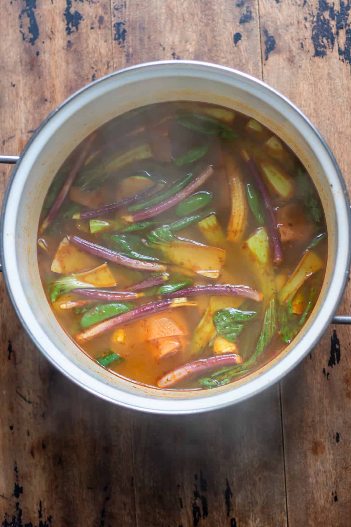 Stir fry vegetables cooked in the soup.
